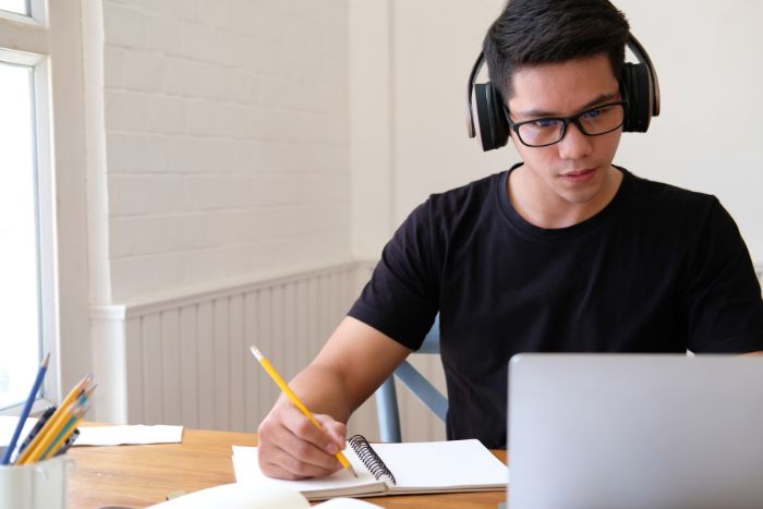 a student doing a listening activity